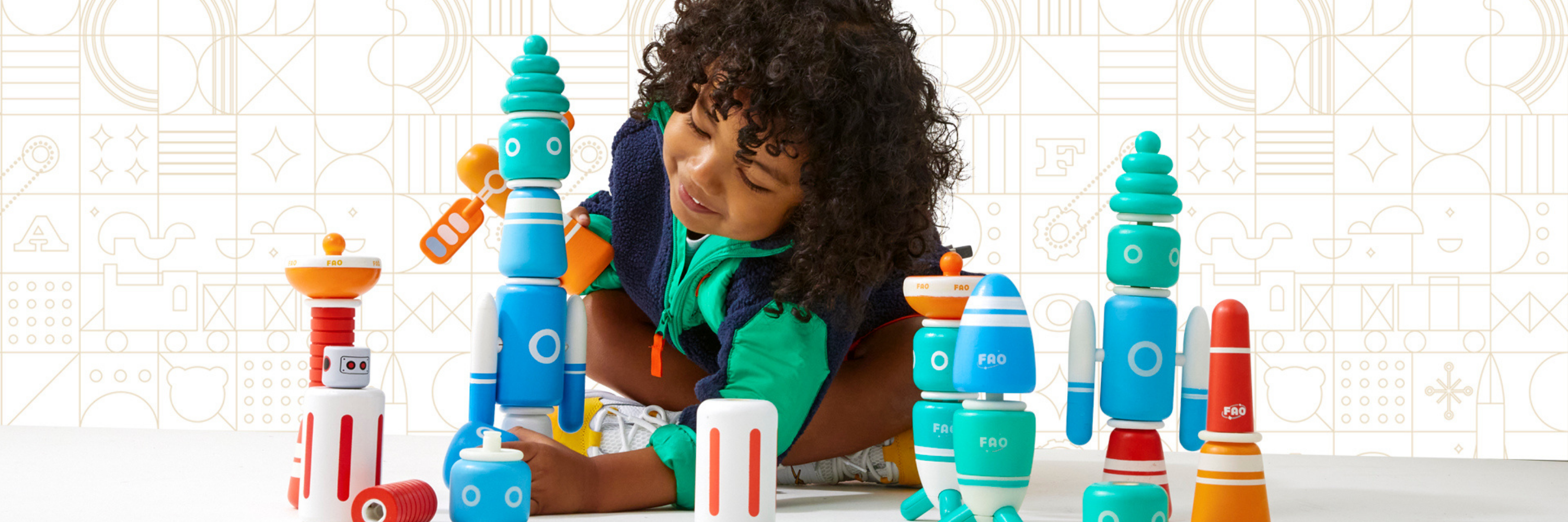 Child playing with colorful building blocks on a light background