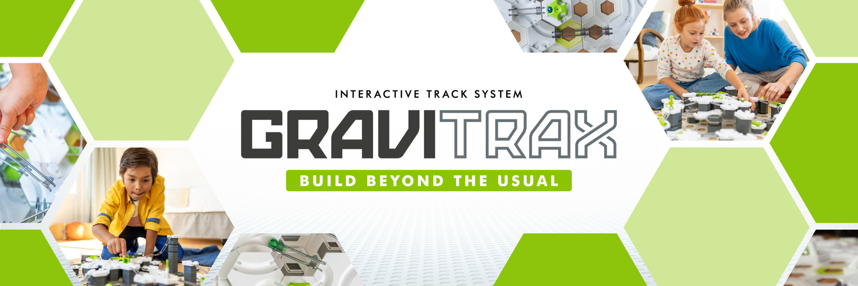 GraviTrax interactive track system banner with children playing and text 'Build Beyond the Usual'.