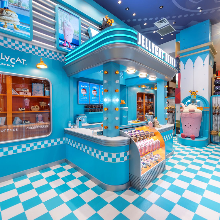 Colorful ice cream shop interior with blue and white checkered floor and walls.