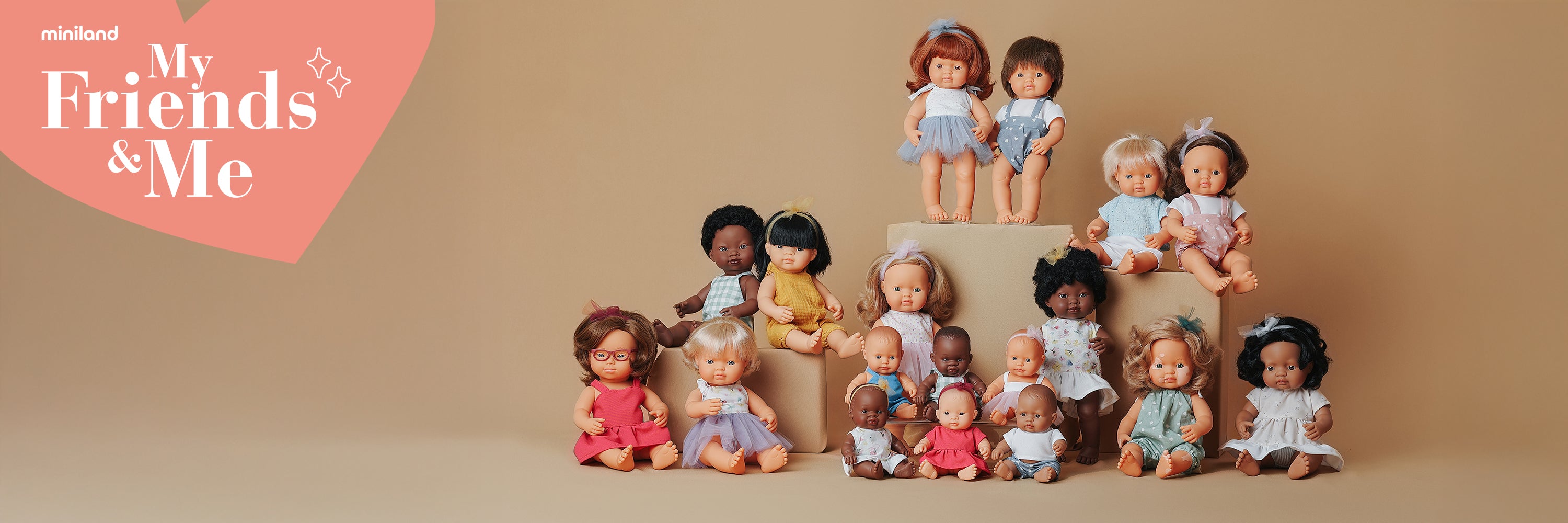Set of 'My Friends & Me' dolls arranged in a pyramid formation on a beige background.