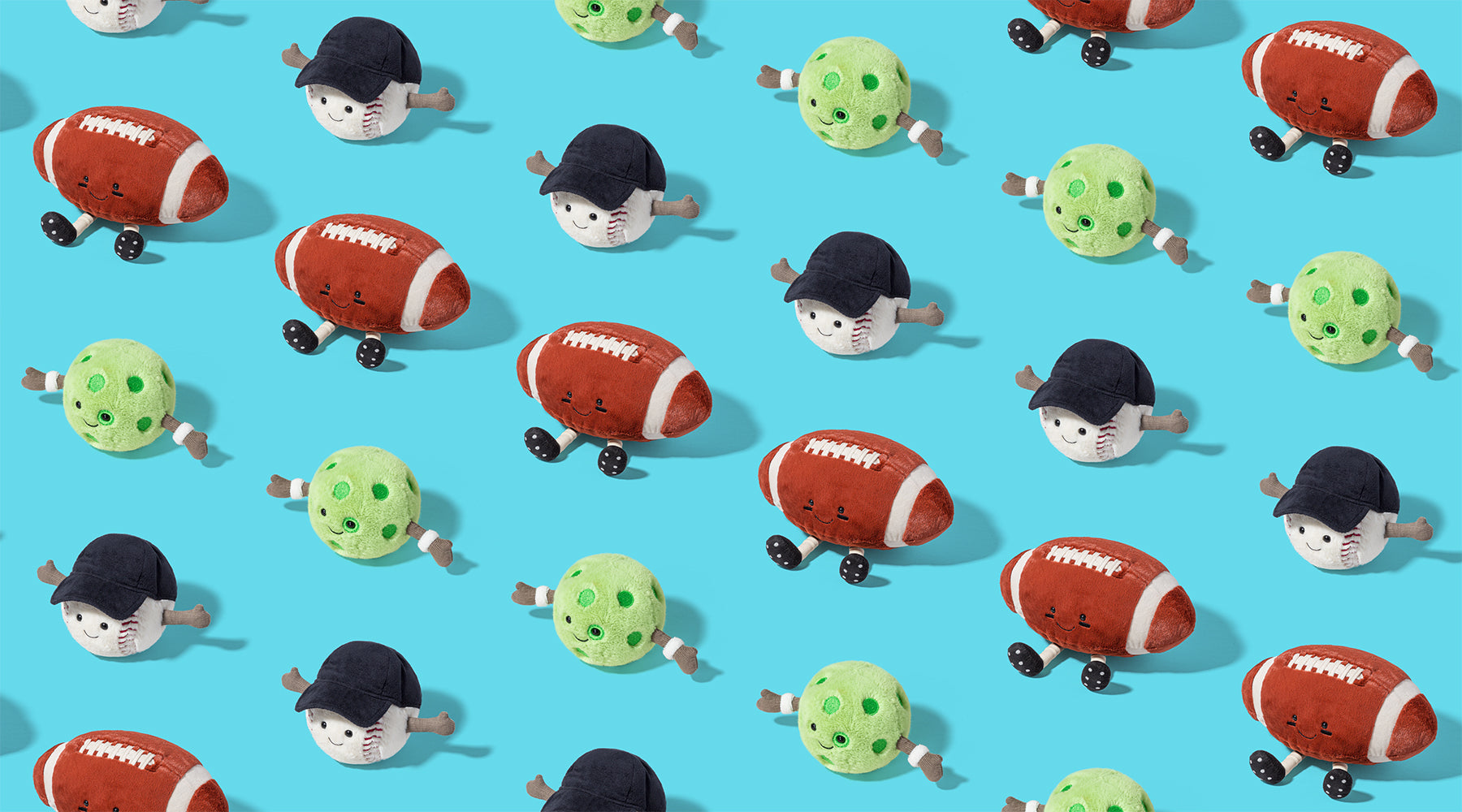 Pattern of toy figures with footballs and soccer balls on a blue background